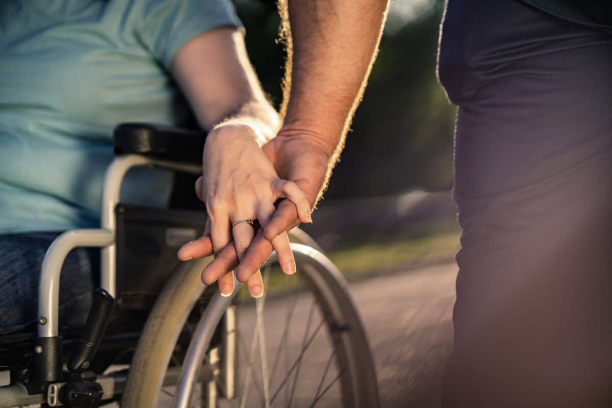 Close Up Holding Hand To Invalid Person