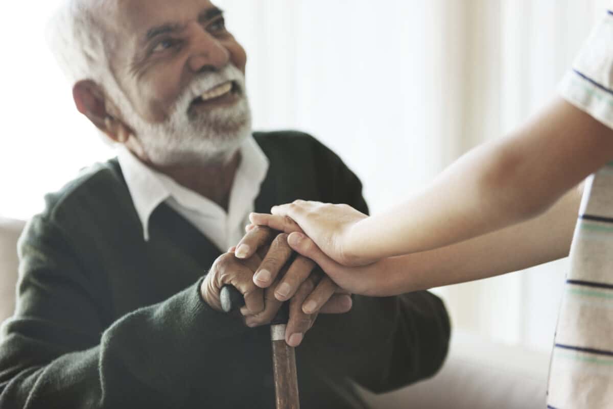 Grandson Holding Grandpa's Hands